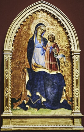 a painting of a woman holding a child