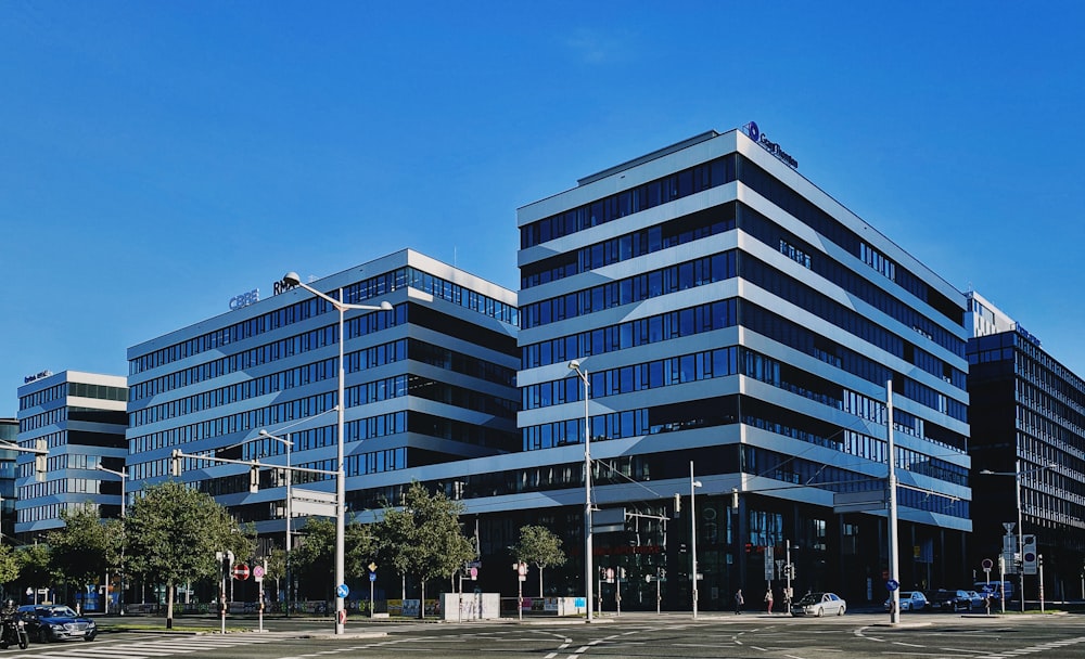 a large office building sitting on the corner of a street