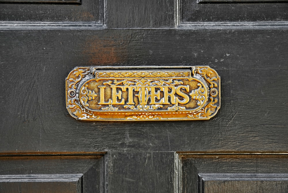 a close up of a door with a sign on it