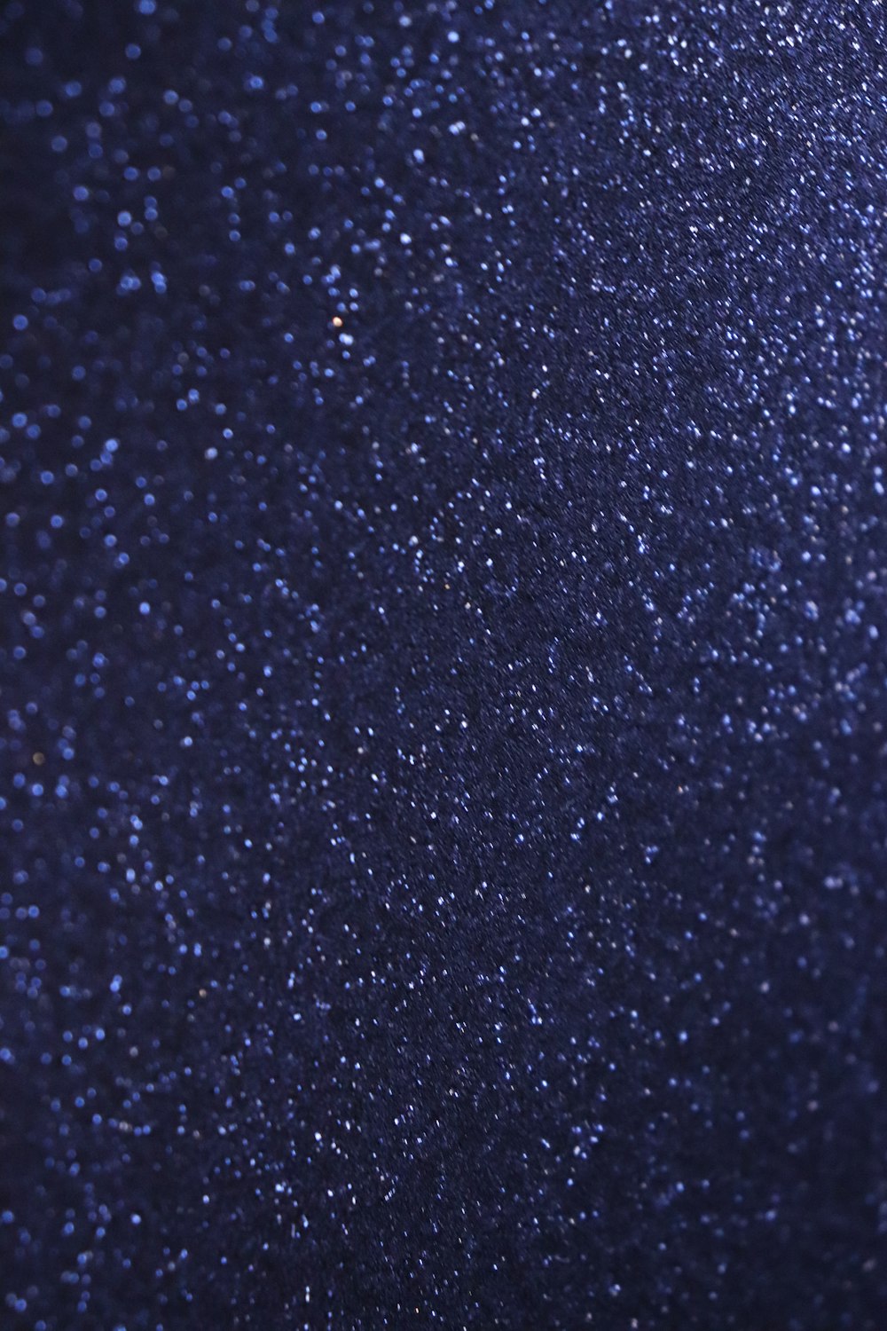 a dark blue background with a lot of stars