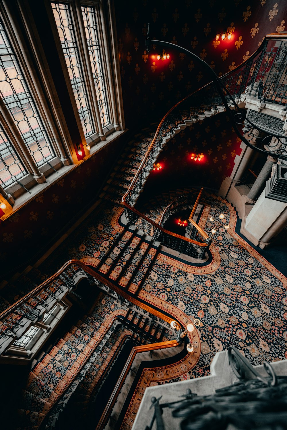 an aerial view of a spiral staircase in a building