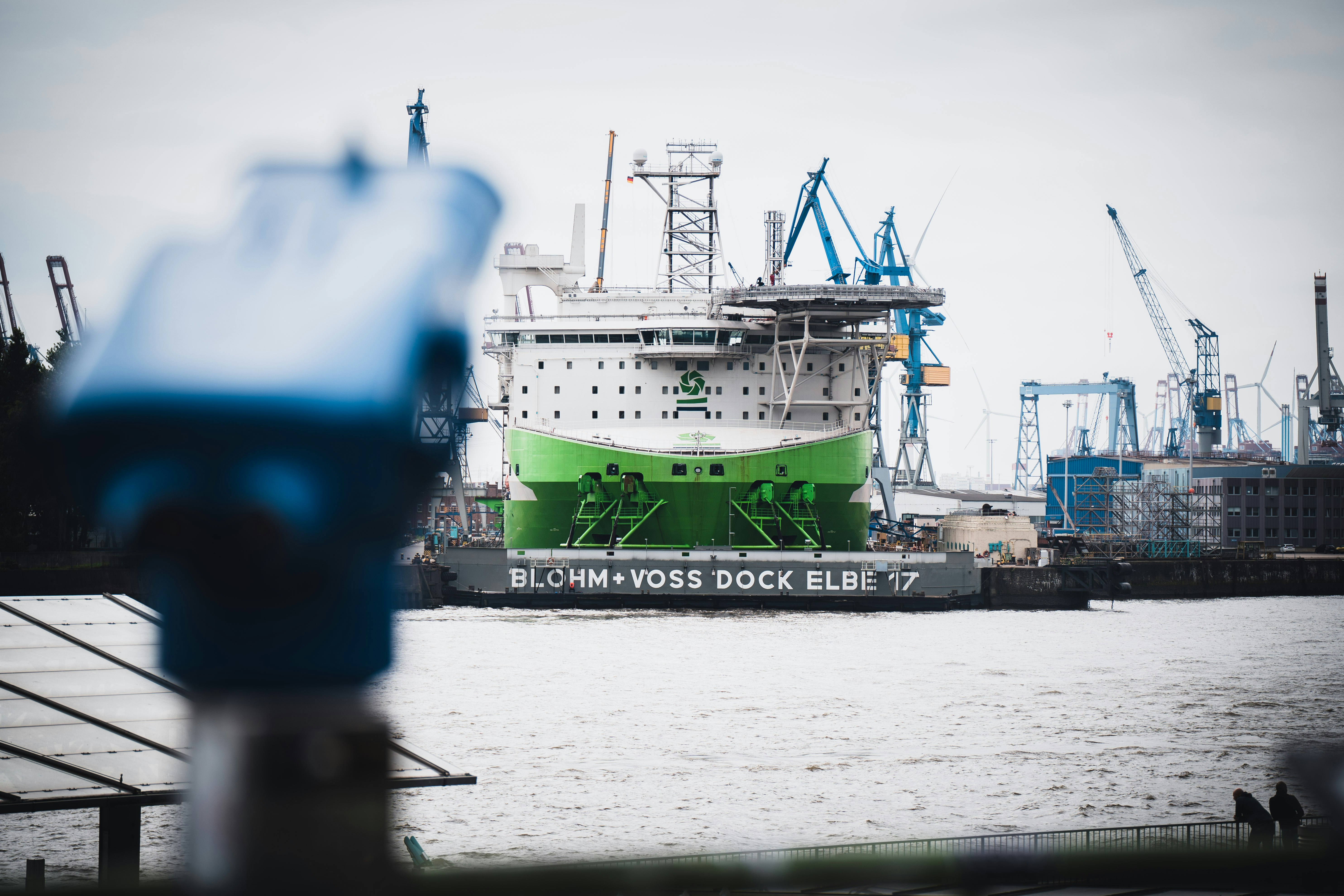 A big ship being repaired at the Hamburg Harbor.