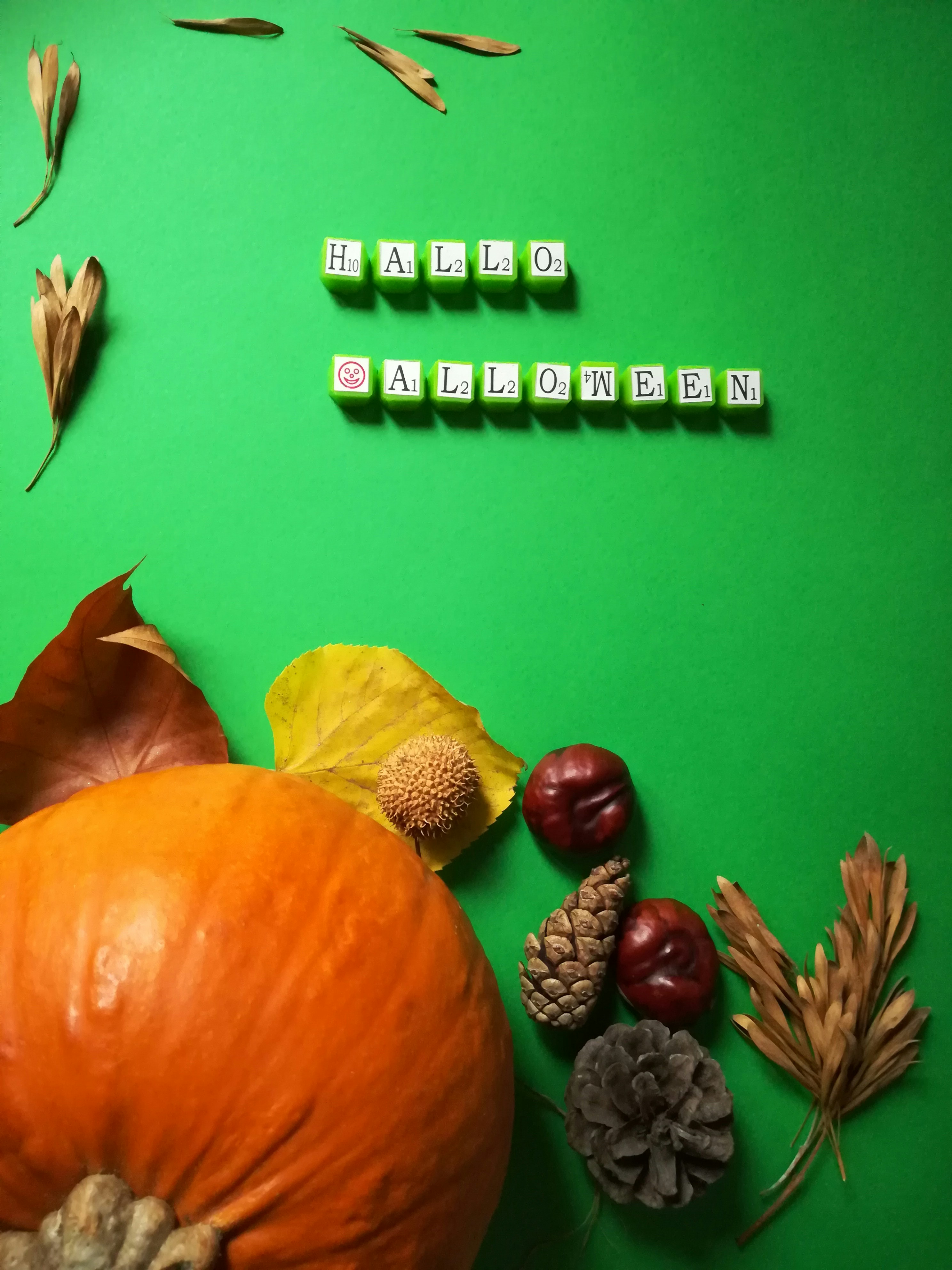 a green table topped with lots of different types of food