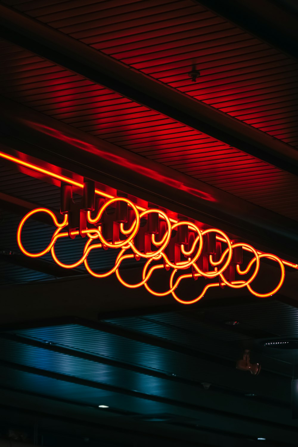 a close up of a neon sign on a building