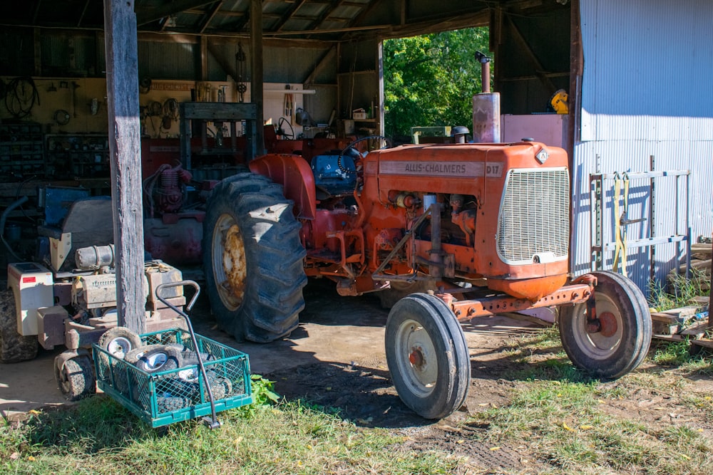 a tractor parked in front of a shed