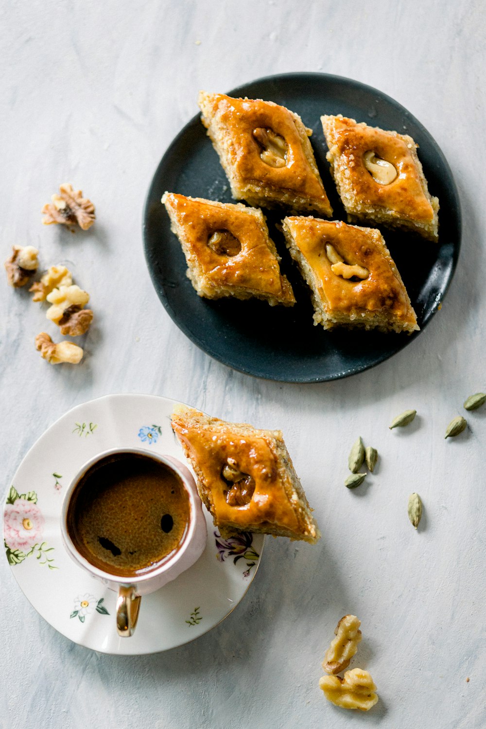 a plate of food and a cup of coffee