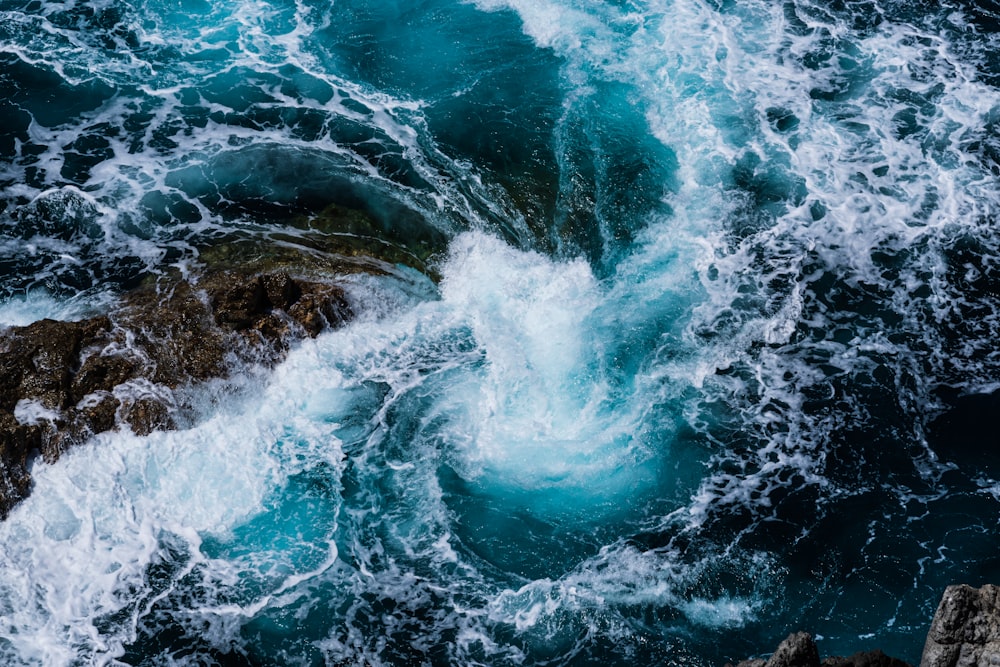 a large body of water surrounded by rocks