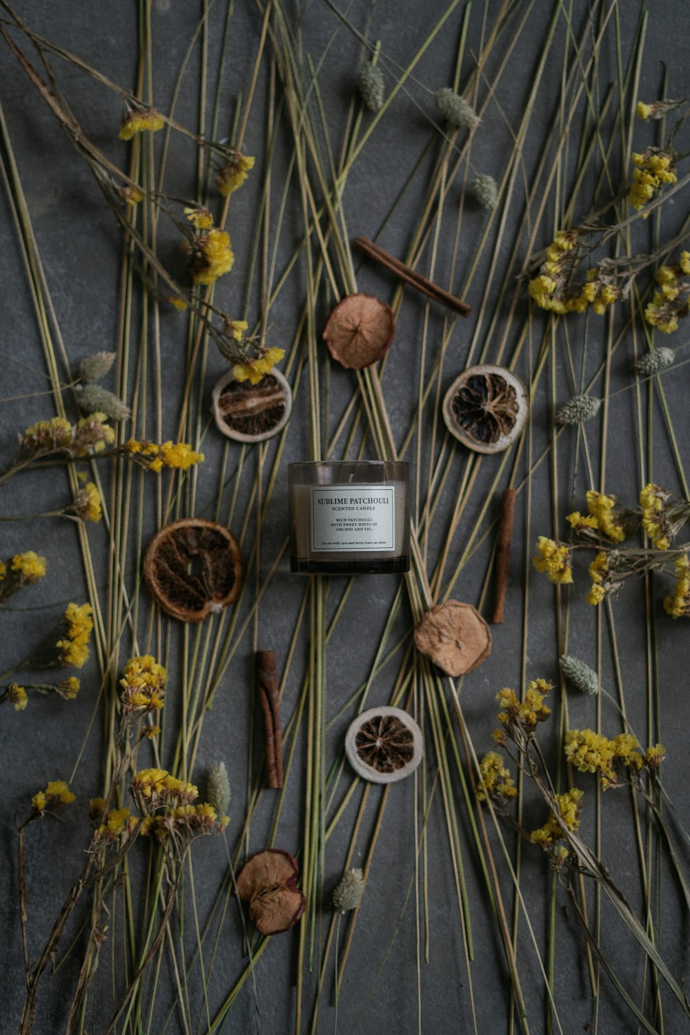 a bunch of dried flowers sitting on top of a table