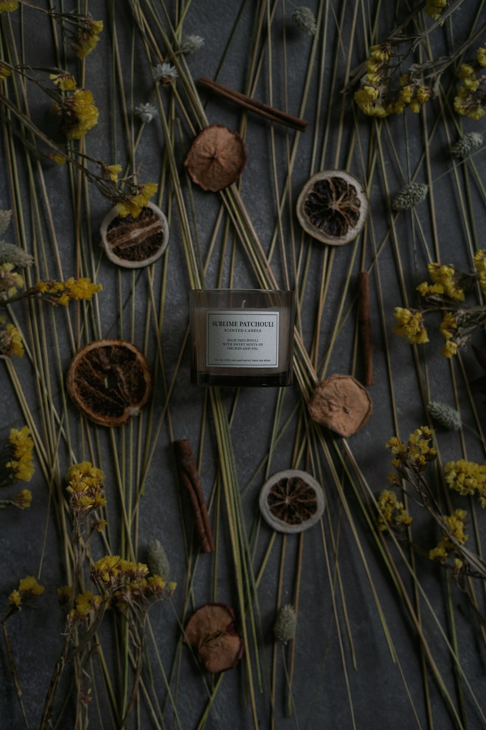 a table topped with lots of different types of herbs