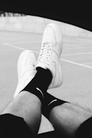 a person sitting in a car with their feet up