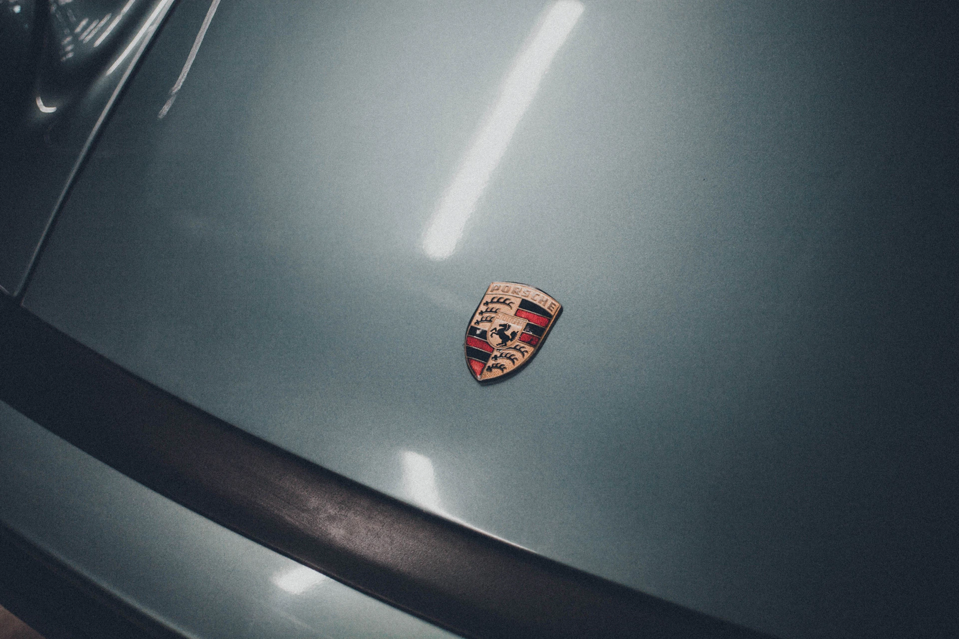 a close up of the emblem on a sports car