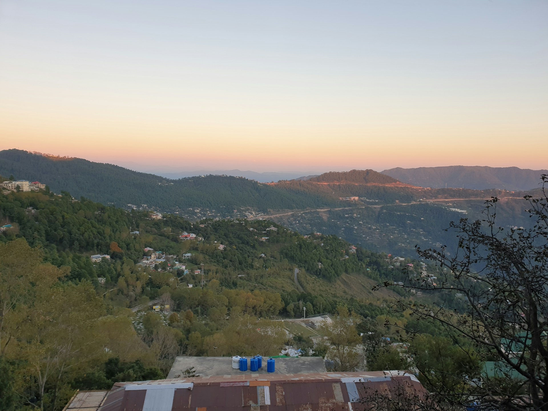 woman wearing yellow long-sleeved dress under white clouds and blue sky during daytime