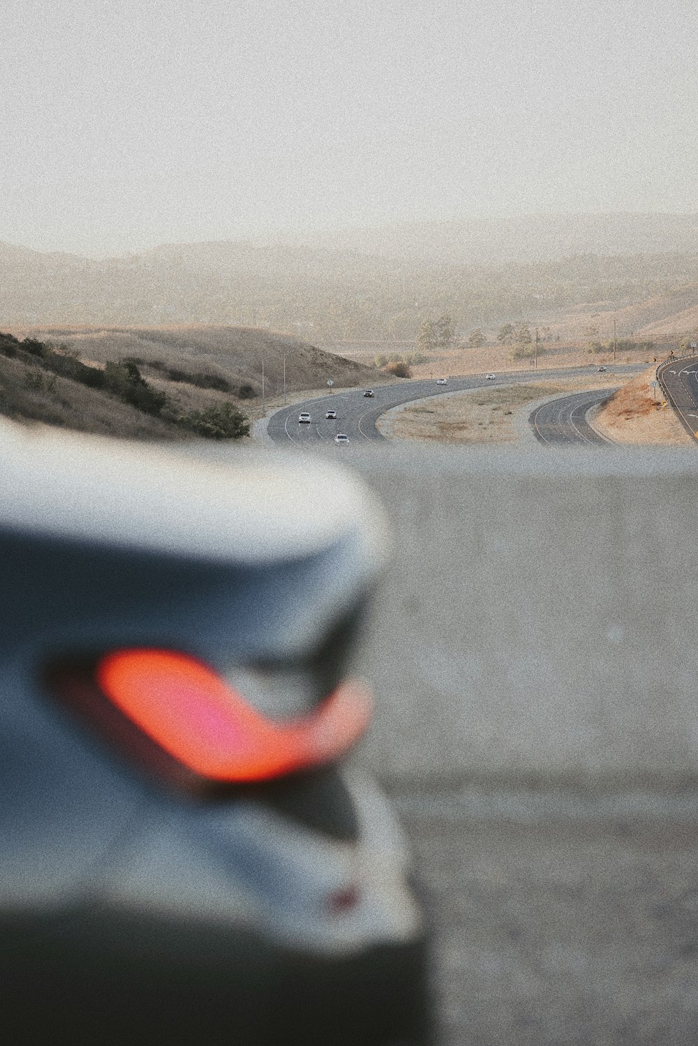 a blurry photo of a car driving down a highway