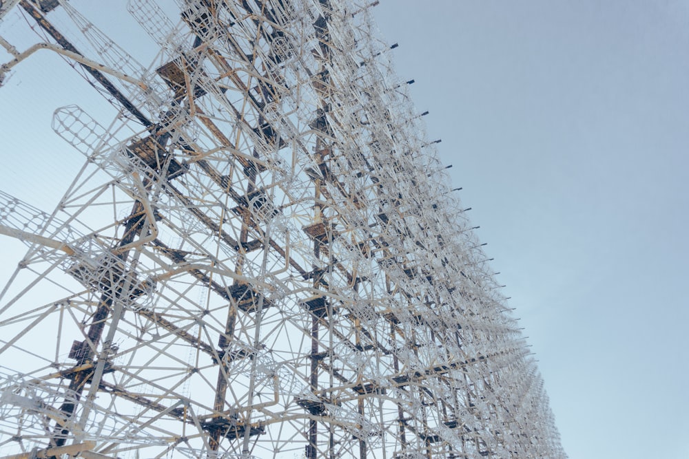 a large metal structure with lots of wires attached to it