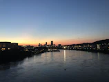 A scenic shot of Buffalo’s skyline at dusk with soft green hues reflecting the brand palette.