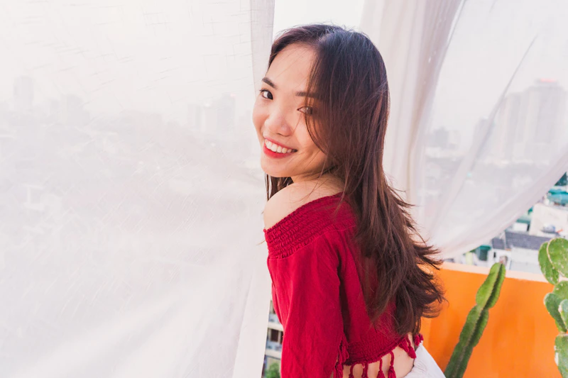 Smiling Filipino Sugar Baby in a red top