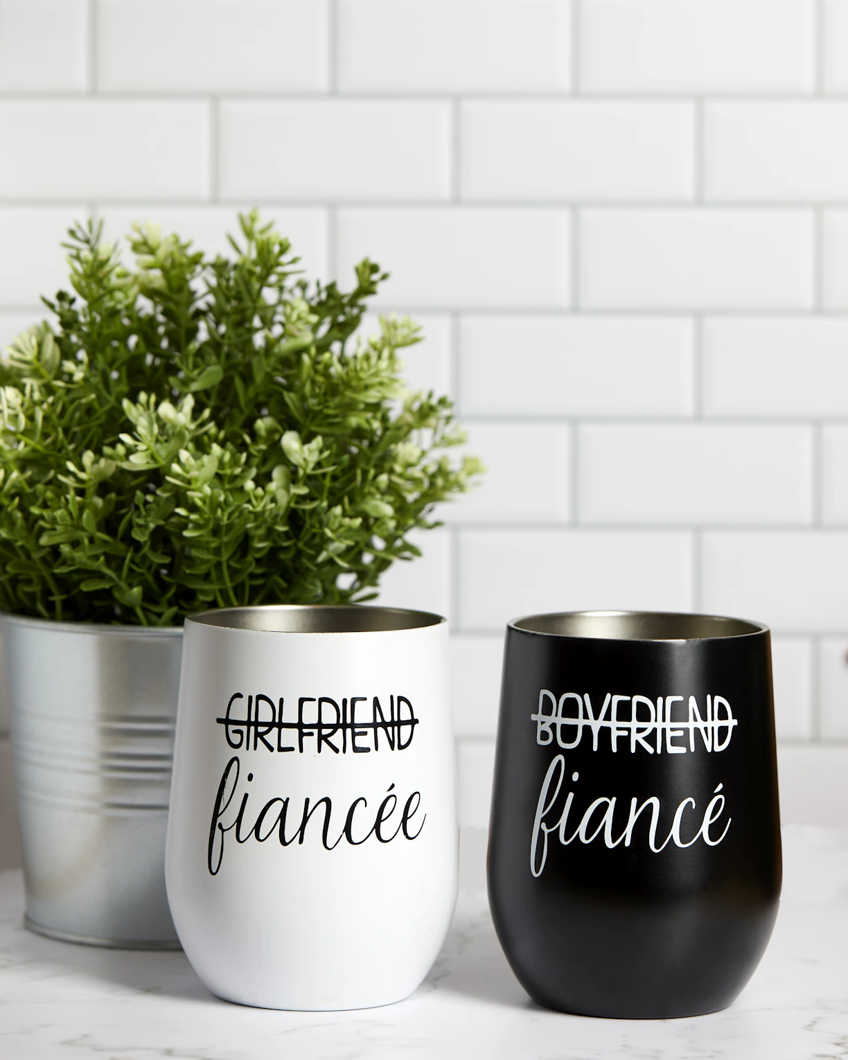 a couple of cups that are on a table