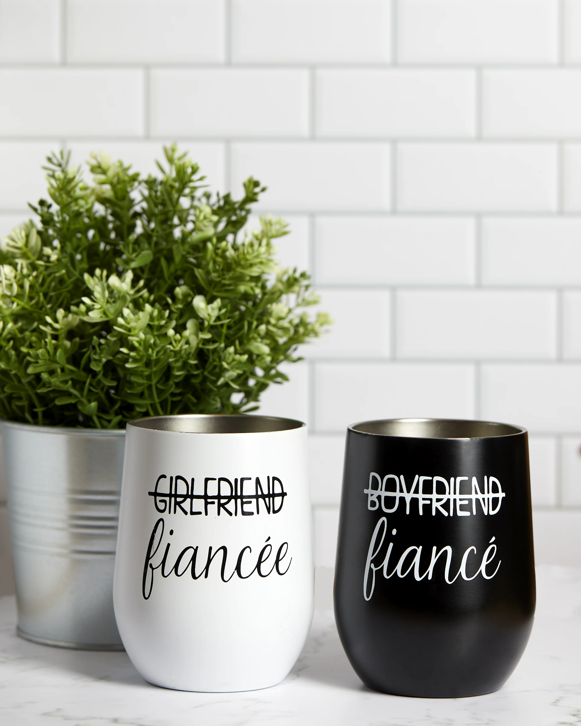 a couple of cups that are on a table