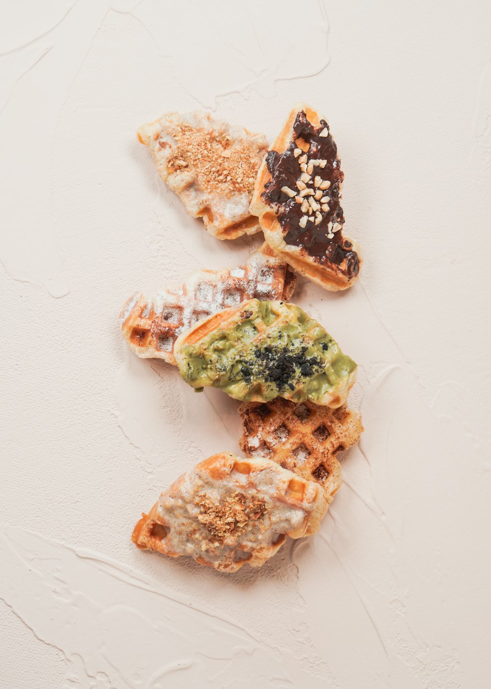 a pile of food sitting on top of a white table