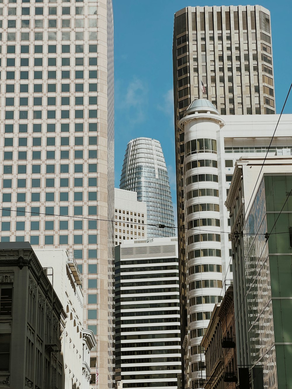 a group of tall buildings in a city