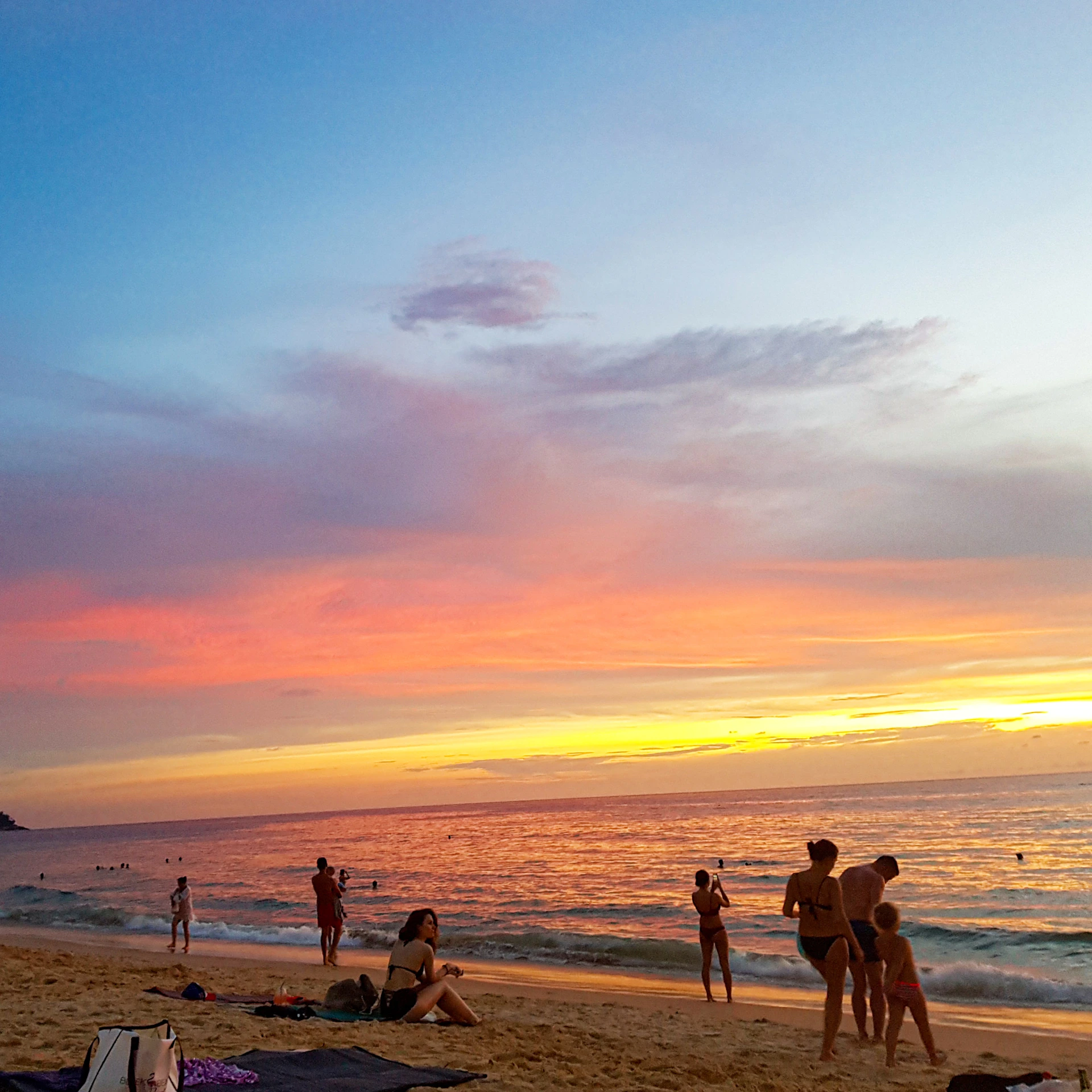 woman wearing yellow long-sleeved dress under white clouds and blue sky during daytime