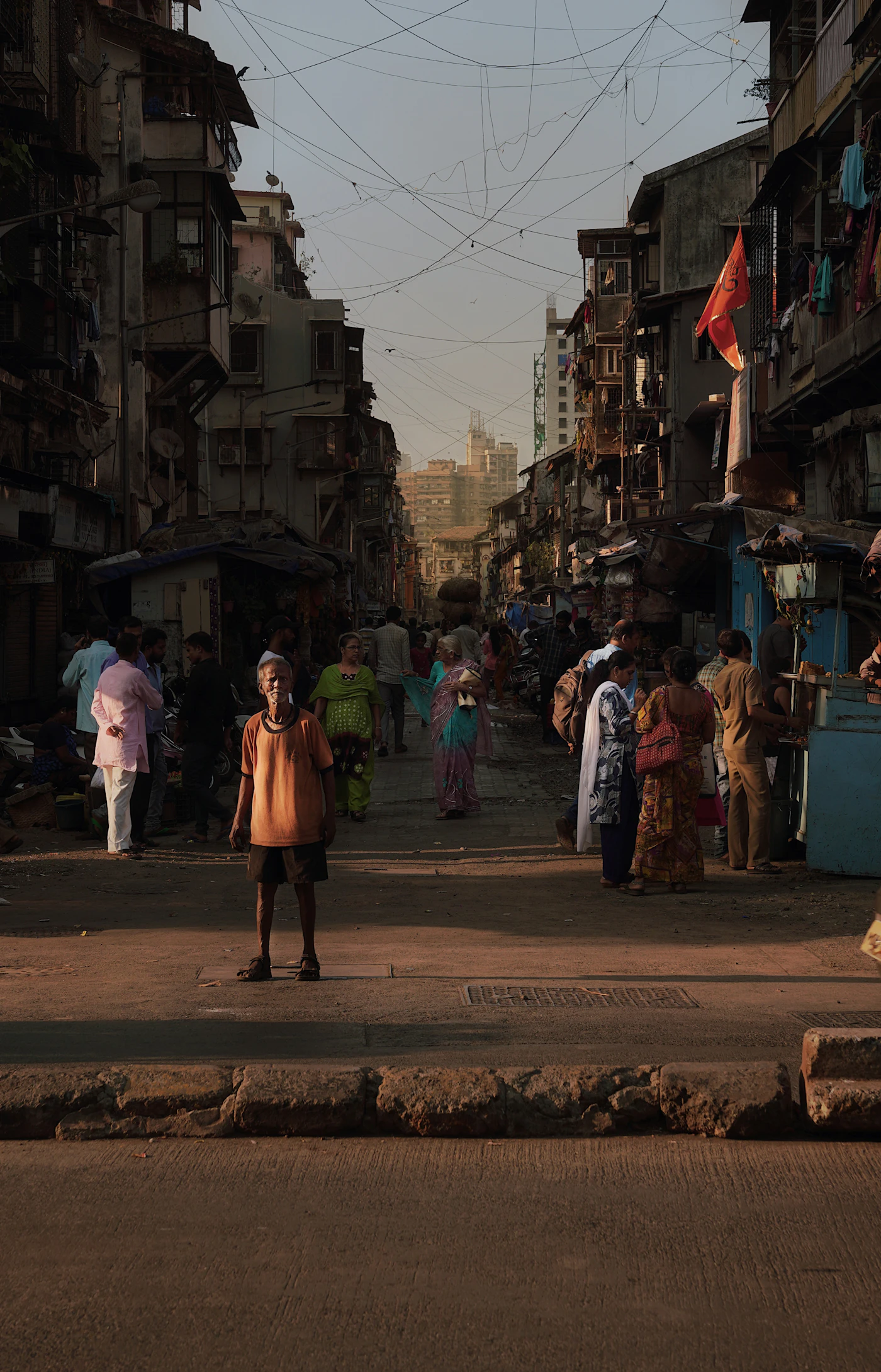 A woman in India checking her smartphone for an order update