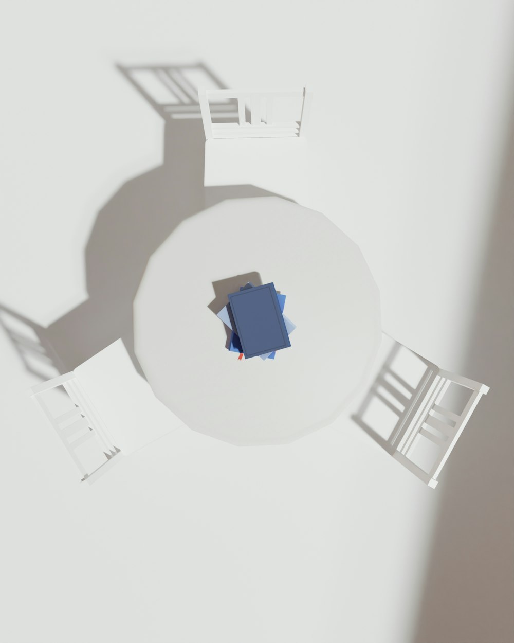 an overhead view of a table and chairs