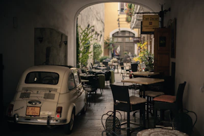 An old car in a café courtyard off the main street — Košice, Slovakia