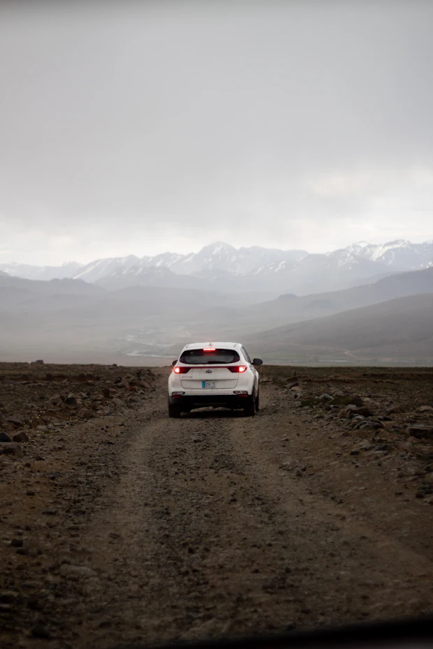 A vehicle on the open dirt road across Deosai