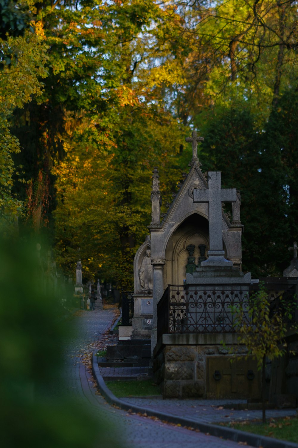 a cemetery in the middle of a wooded area