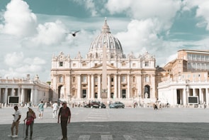 a group of people standing in front of a building