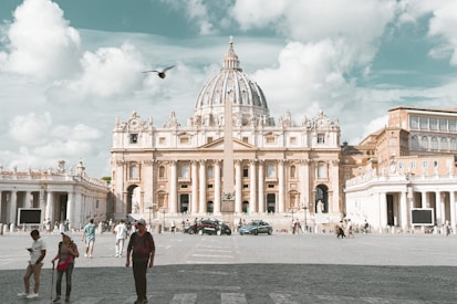 a group of people standing in front of a building