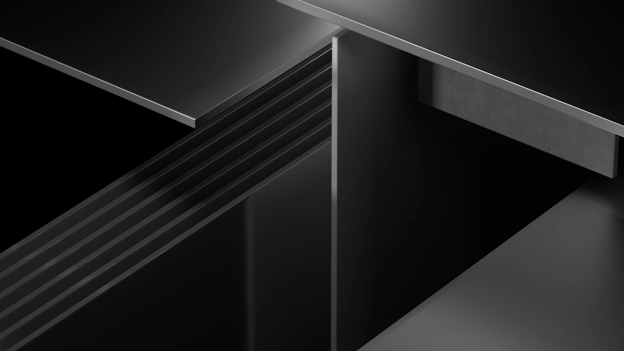 a black and white photo of a metal object