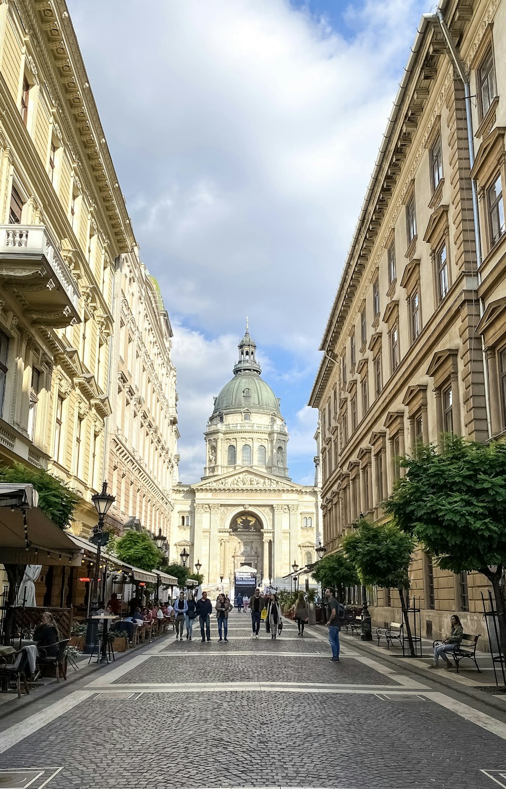 a city street with people walking on it