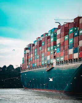 a large cargo ship loaded with lots of containers