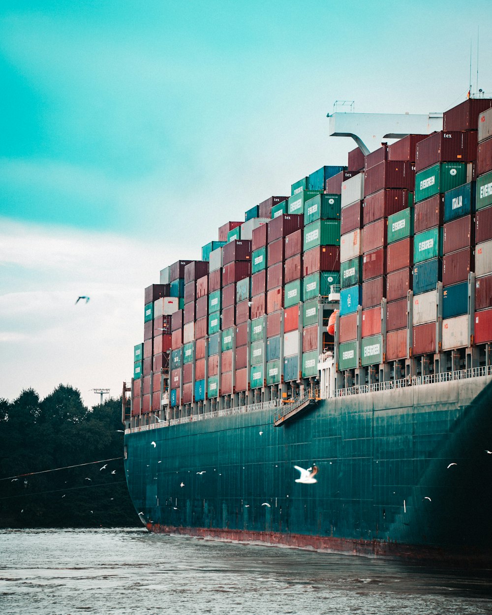 a large cargo ship loaded with lots of containers