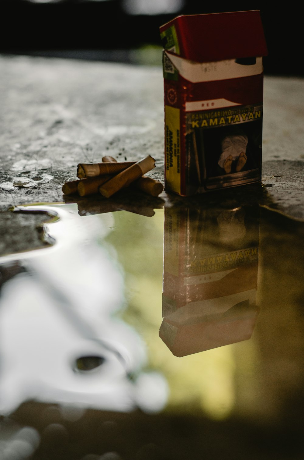 a box of cigarettes sitting on top of a table