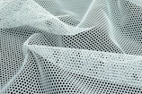 a close up of a black and white mesh