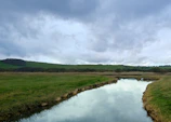 A peaceful view of the Missouri River flowing past tribal lands.