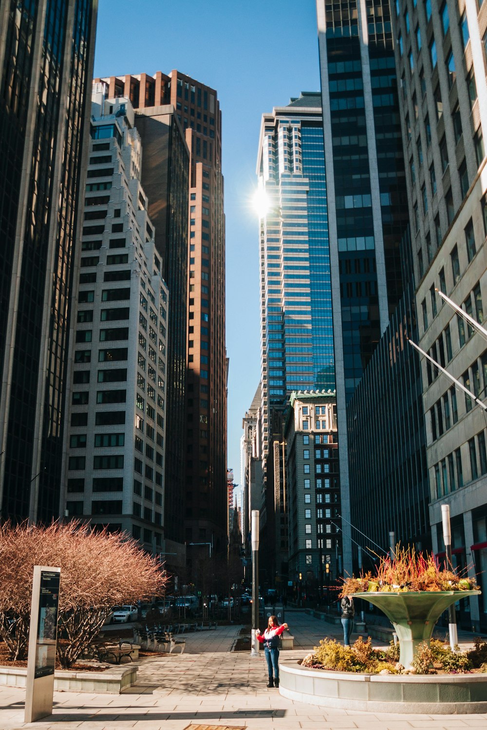 a couple of tall buildings sitting next to each other