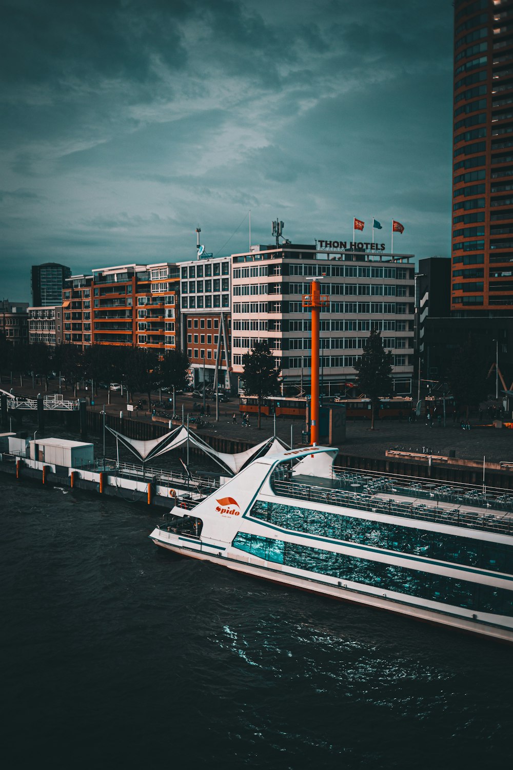 a large white boat floating on top of a body of water