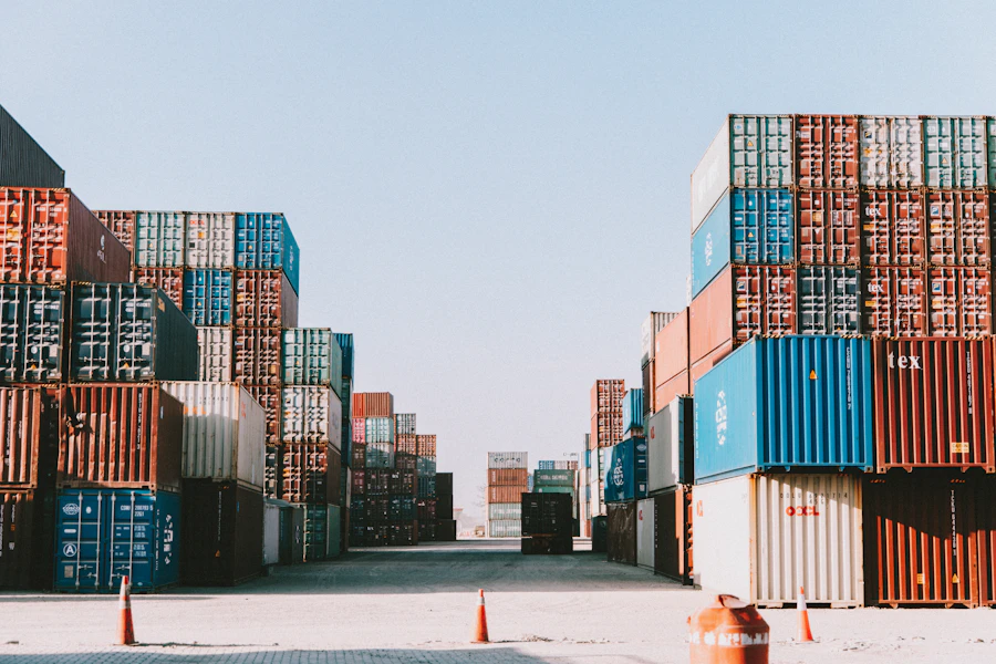 Shipping containers stacked in rows at a freight terminal