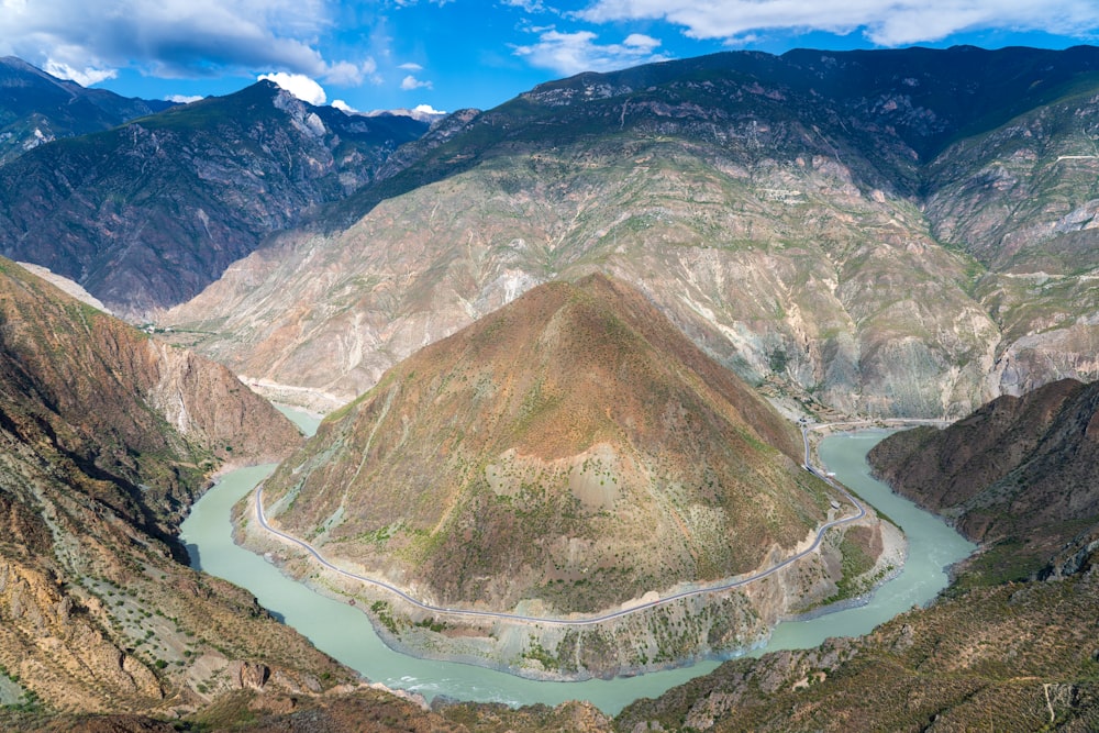 a view of a river running through a valley