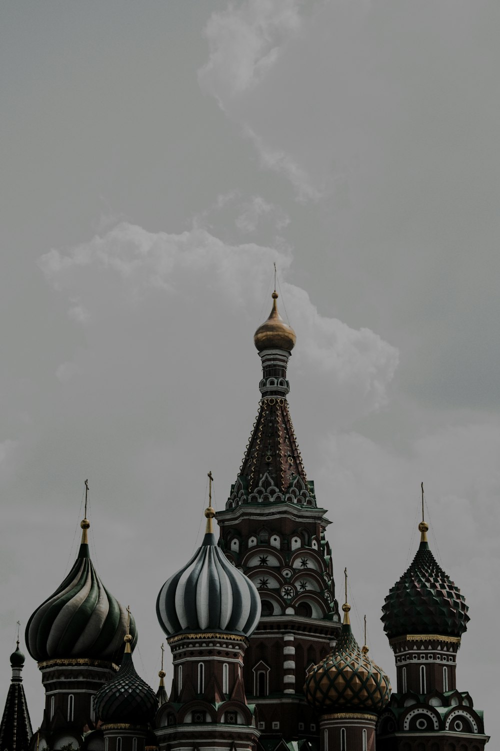 a very tall building with a clock on it's side