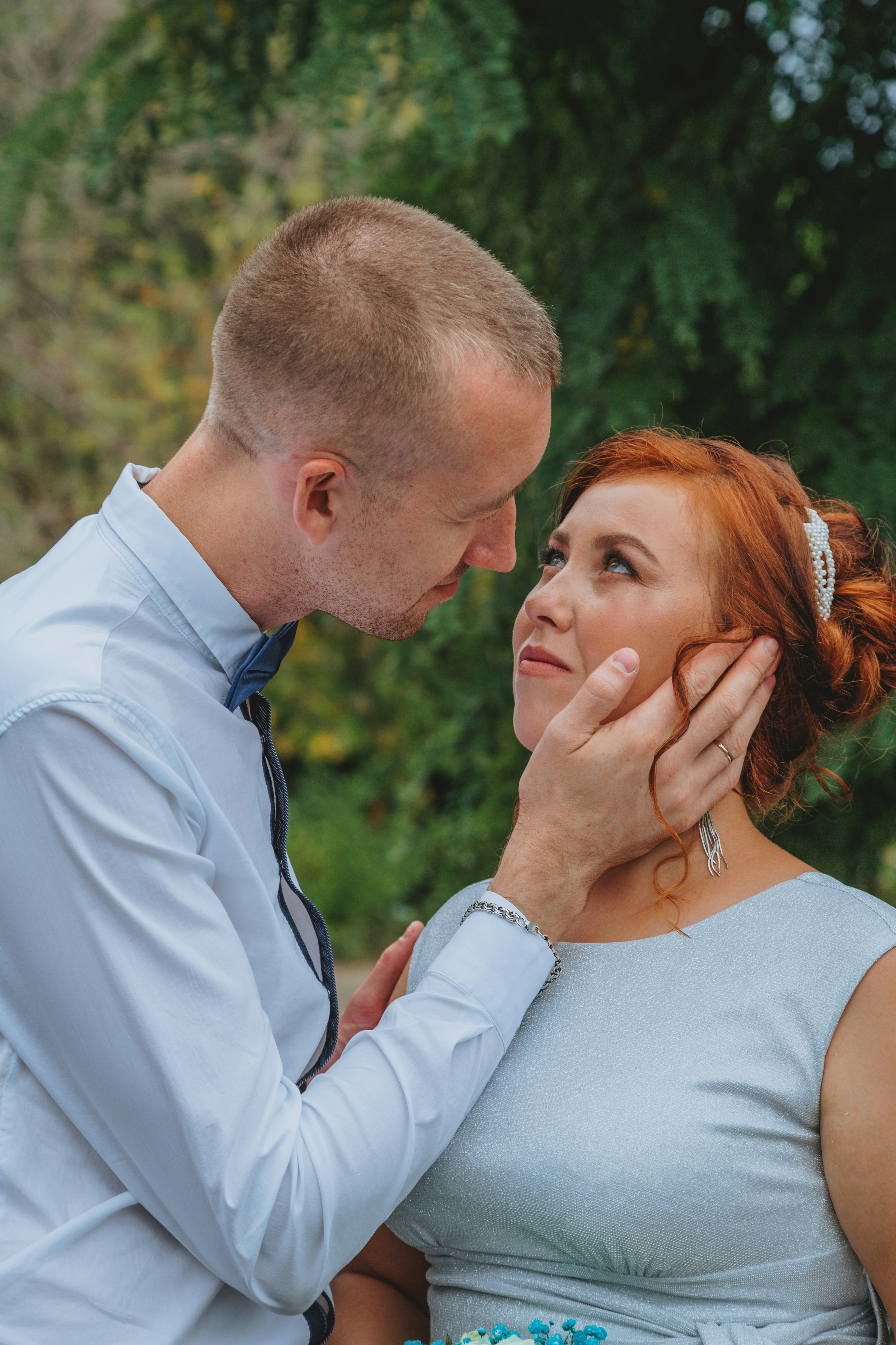 a man and woman standing next to each other