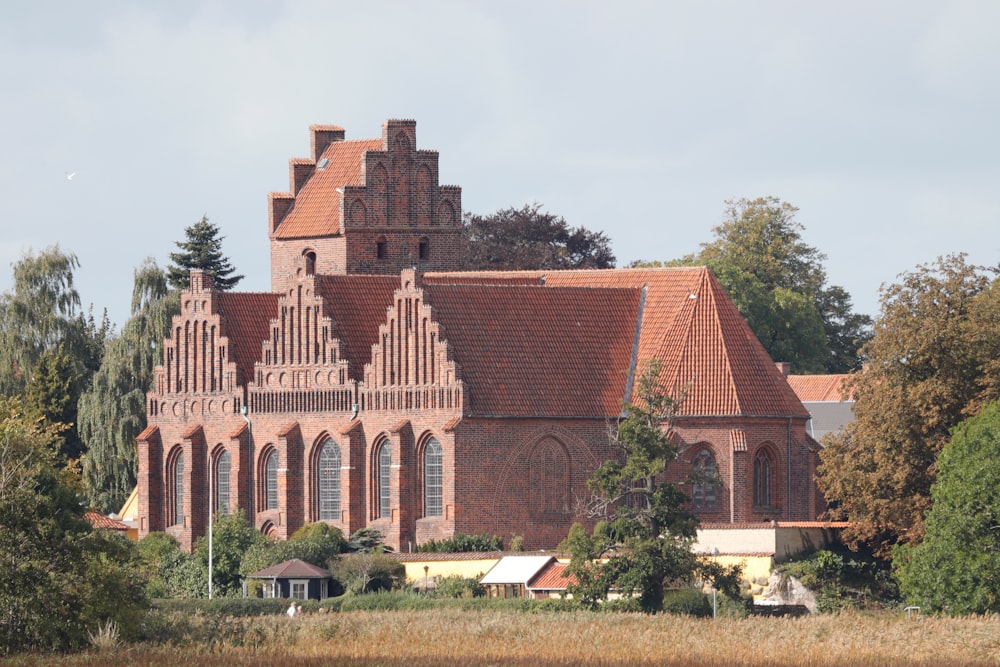 a large brick building with a clock tower