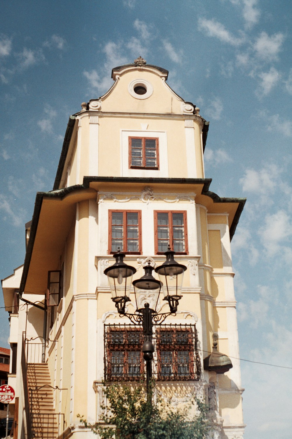 a tall building with a clock on the top of it