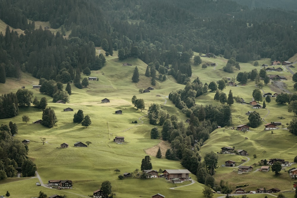 an aerial view of a small village in the mountains