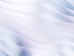 A calming light blue abstract background with soft waves symbolizing tranquility.