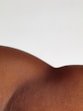 a close up of a person's back with no shirt on